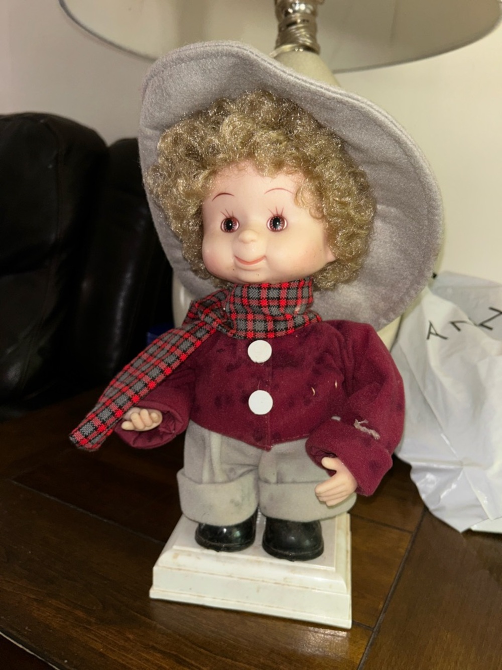 Vintage Curly-Haired Doll in Burgundy Coat and Gray Hat